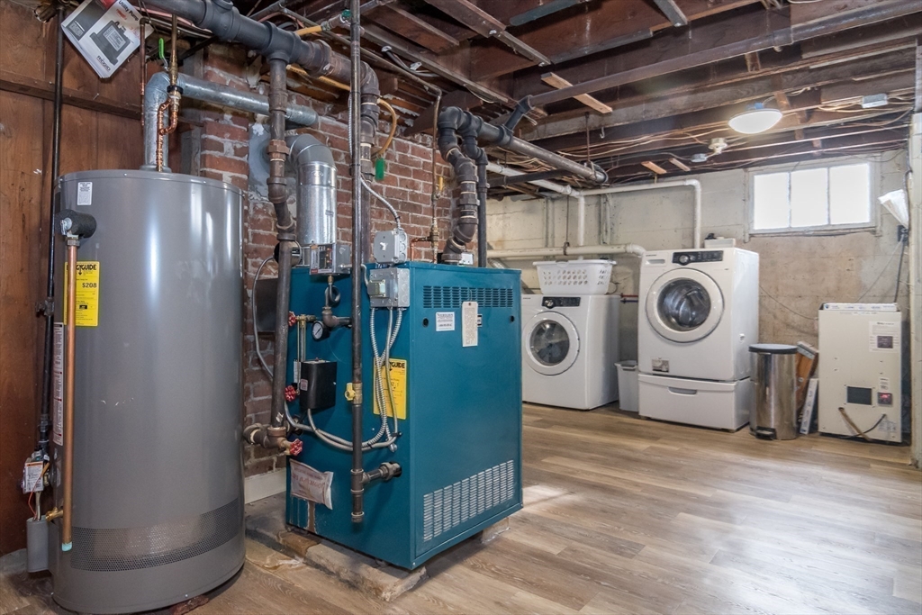 5 Hillcrest Road Framingham, MA 01702 - Photo 23 of 30 a utility room with fridge dryer and washer