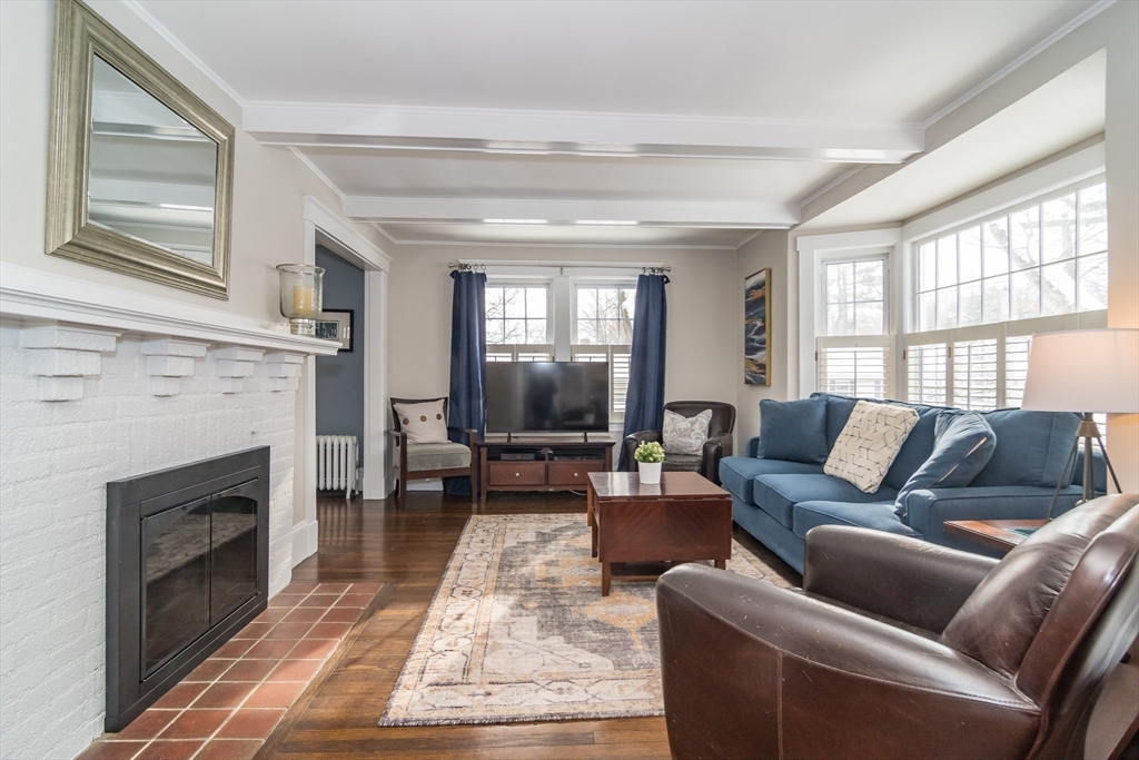 5 Hillcrest Road Framingham, MA 01702 - Photo 4 of 30 a living room with furniture and a fireplace