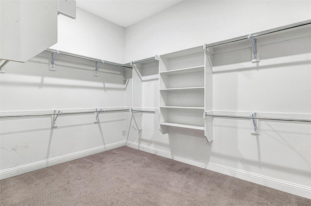 468 Caitlyn Way Fairview, TX 75069 - Photo 9 of 16 a view of an empty walk in closet