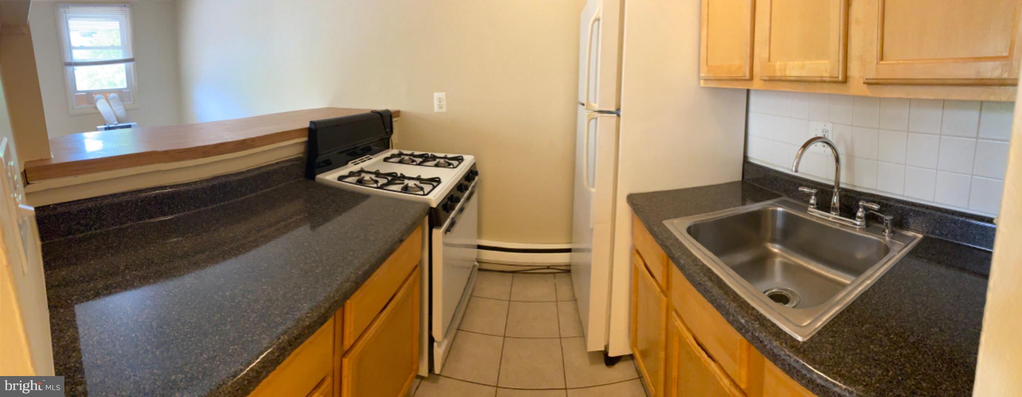 9323 Matador Road Columbia, MD 21045 - Photo 21 of 22 Charming kitchen with modern finishes.