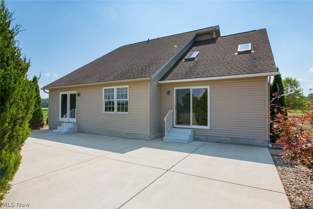 13719 Kelley Road Milan, OH 44846 - Photo 5 of 28 Large patio at back of home with easy access from the family room or master bedroom