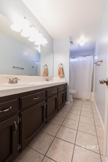 620 East Wilson Avenue Ridgecrest, CA 93555 - Photo 19 of 30 a kitchen with a sink and cabinets