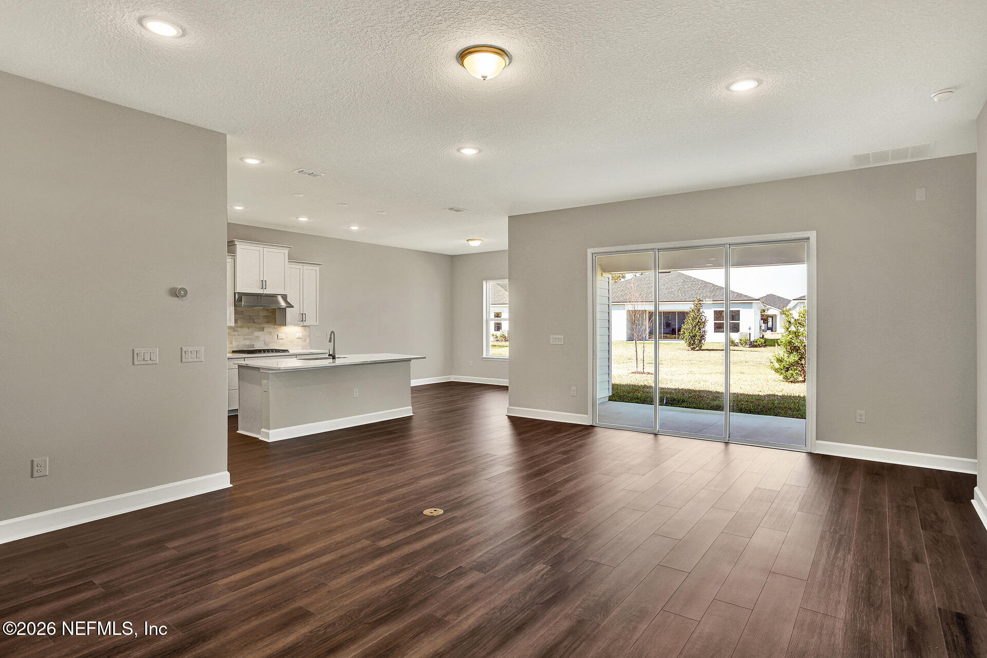 70 Ribera Drive, Unit 323 Flagler Beach, FL 32136 - Photo 9 of 16 a view of kitchen with refrigerator and window
