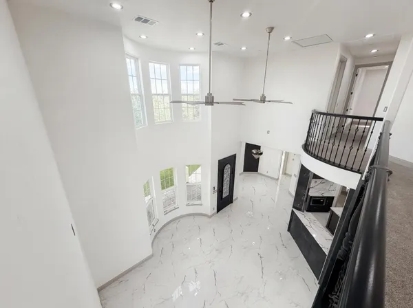 a kitchen with furniture and a fireplace