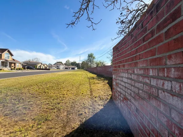 a house with trees in the background