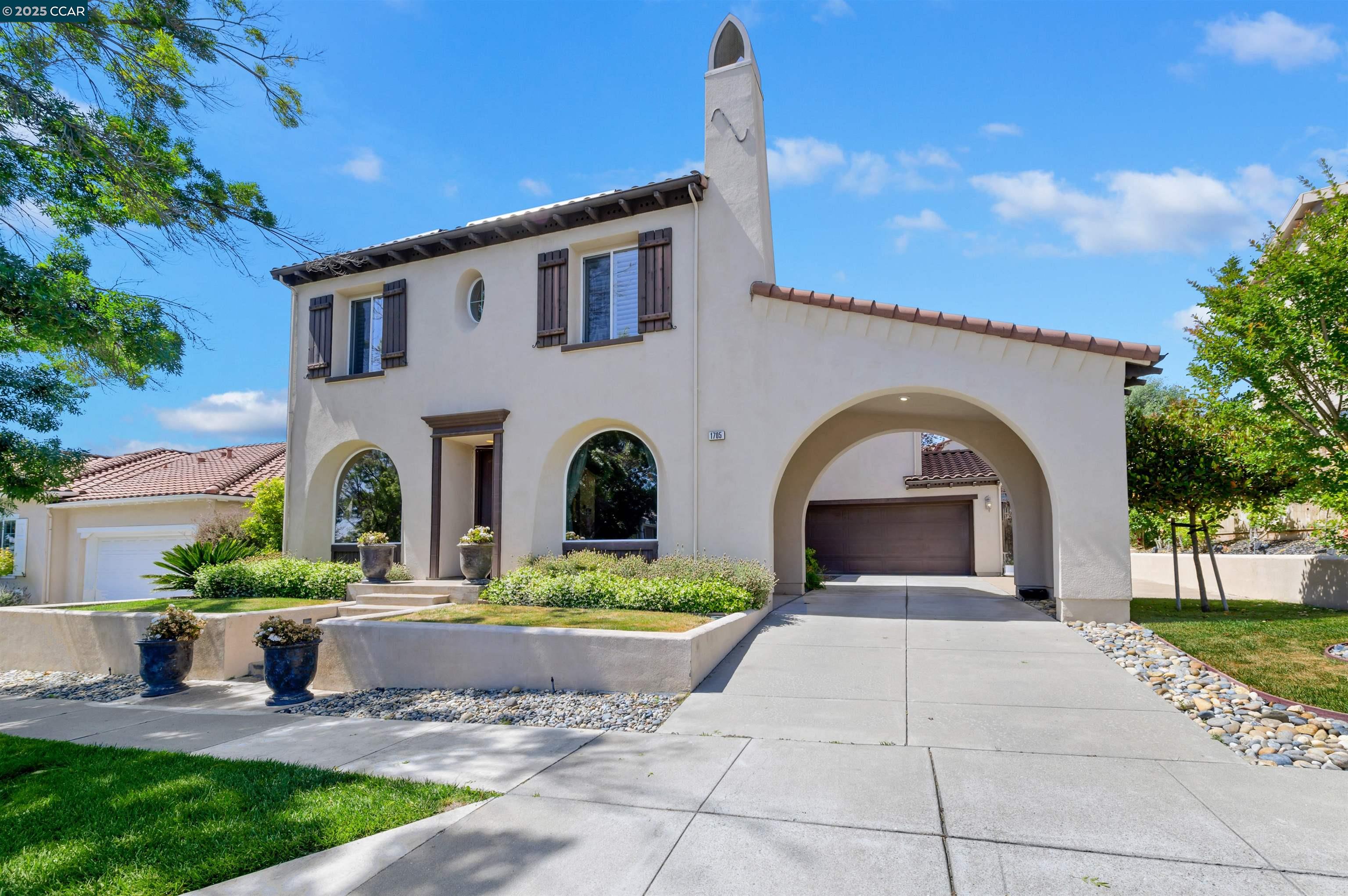 1705 Campanula Drive San Ramon, CA 94582 - Photo 1 of 1 a front view of a house with garden