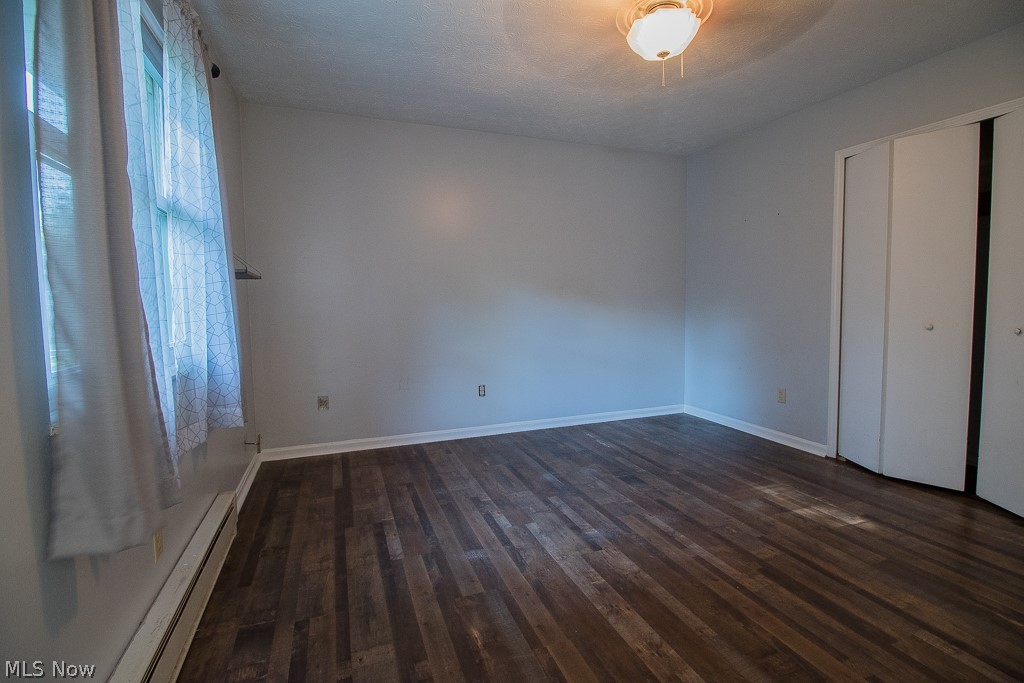 2744 Haines Road Madison, OH 44057 - Photo 23 of 26 Bedroom featuring wood-style flooring