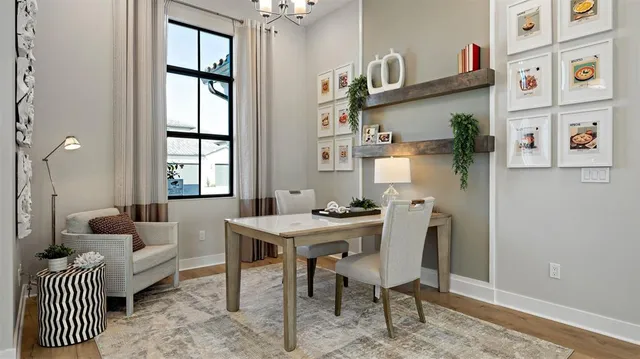 a view of a livingroom with furniture and window