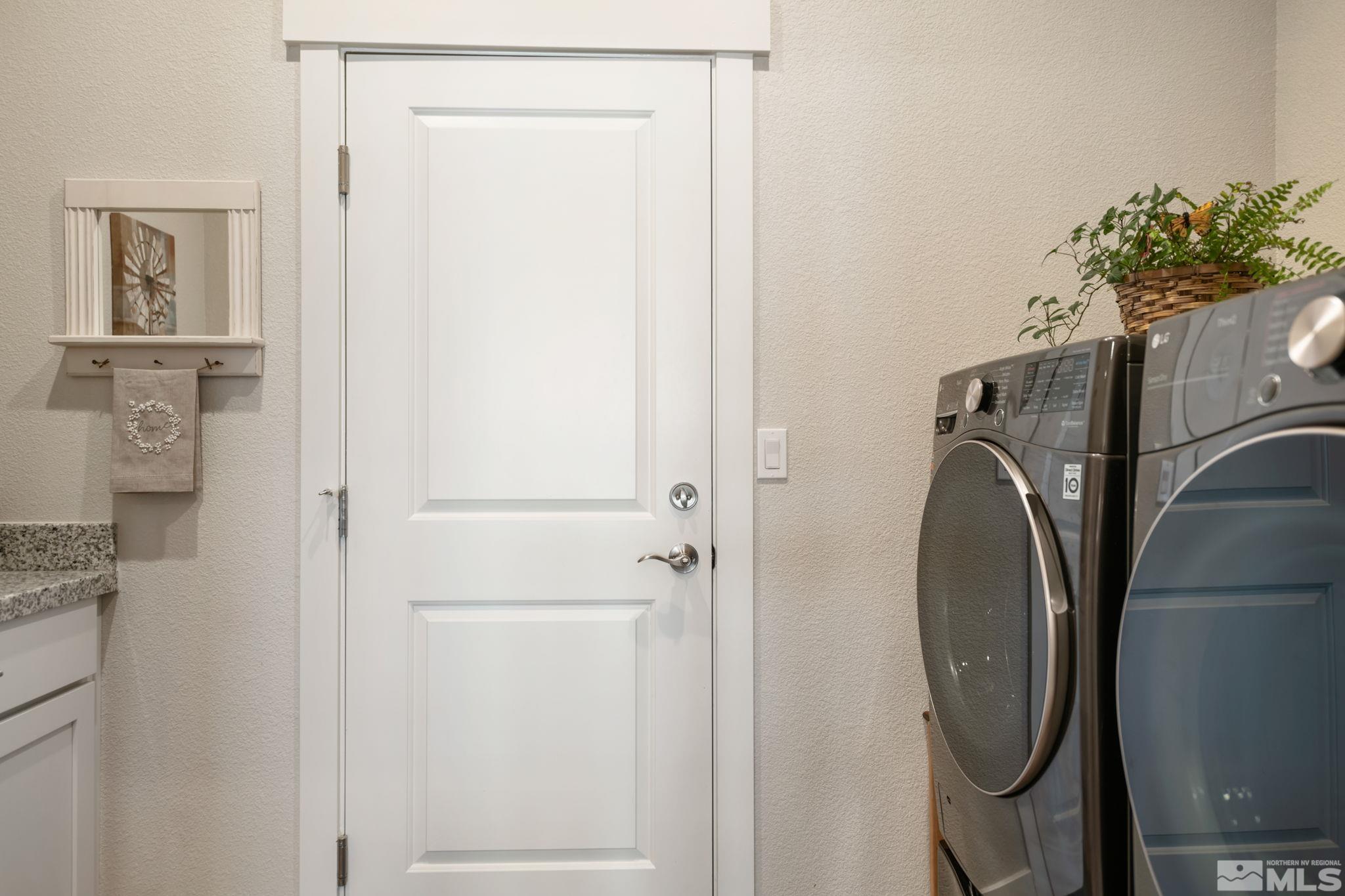 233 Cecina Drive Dayton, NV 89403 - Photo 20 of 39 a utility room with shower and mirror