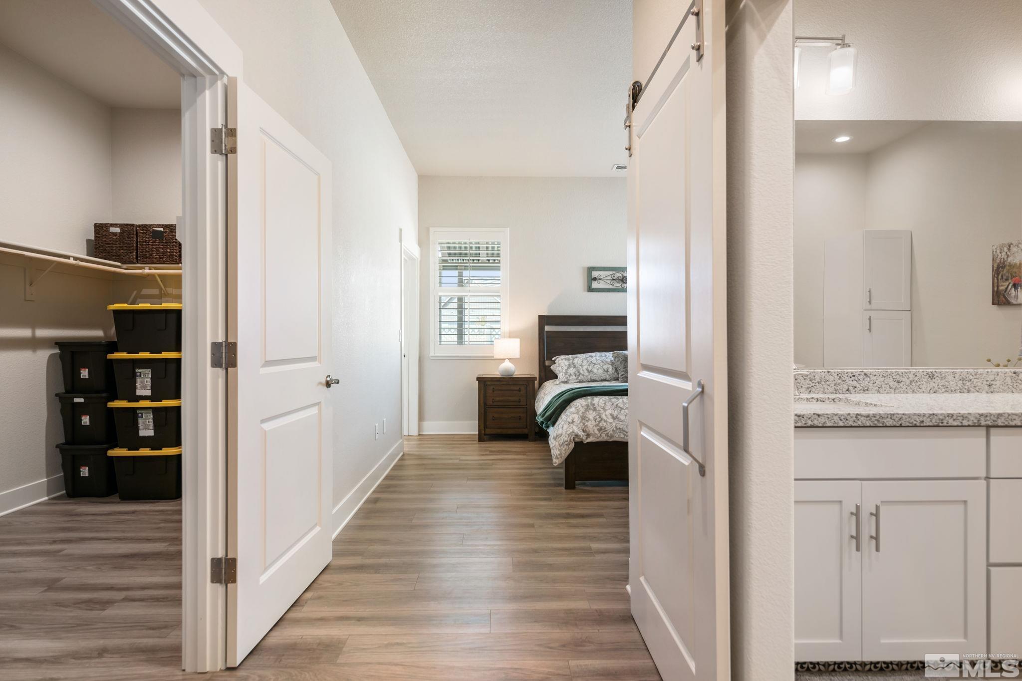 233 Cecina Drive Dayton, NV 89403 - Photo 23 of 39 a en suite bathroom with a sink and a mirror