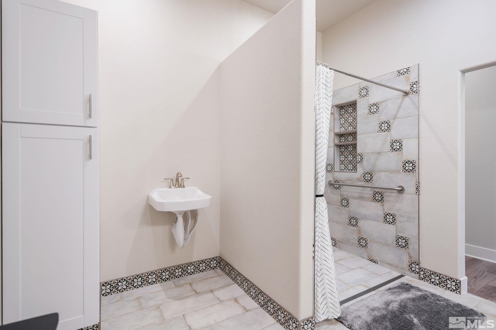 233 Cecina Drive Dayton, NV 89403 - Photo 25 of 39 a view of a bathroom with shower