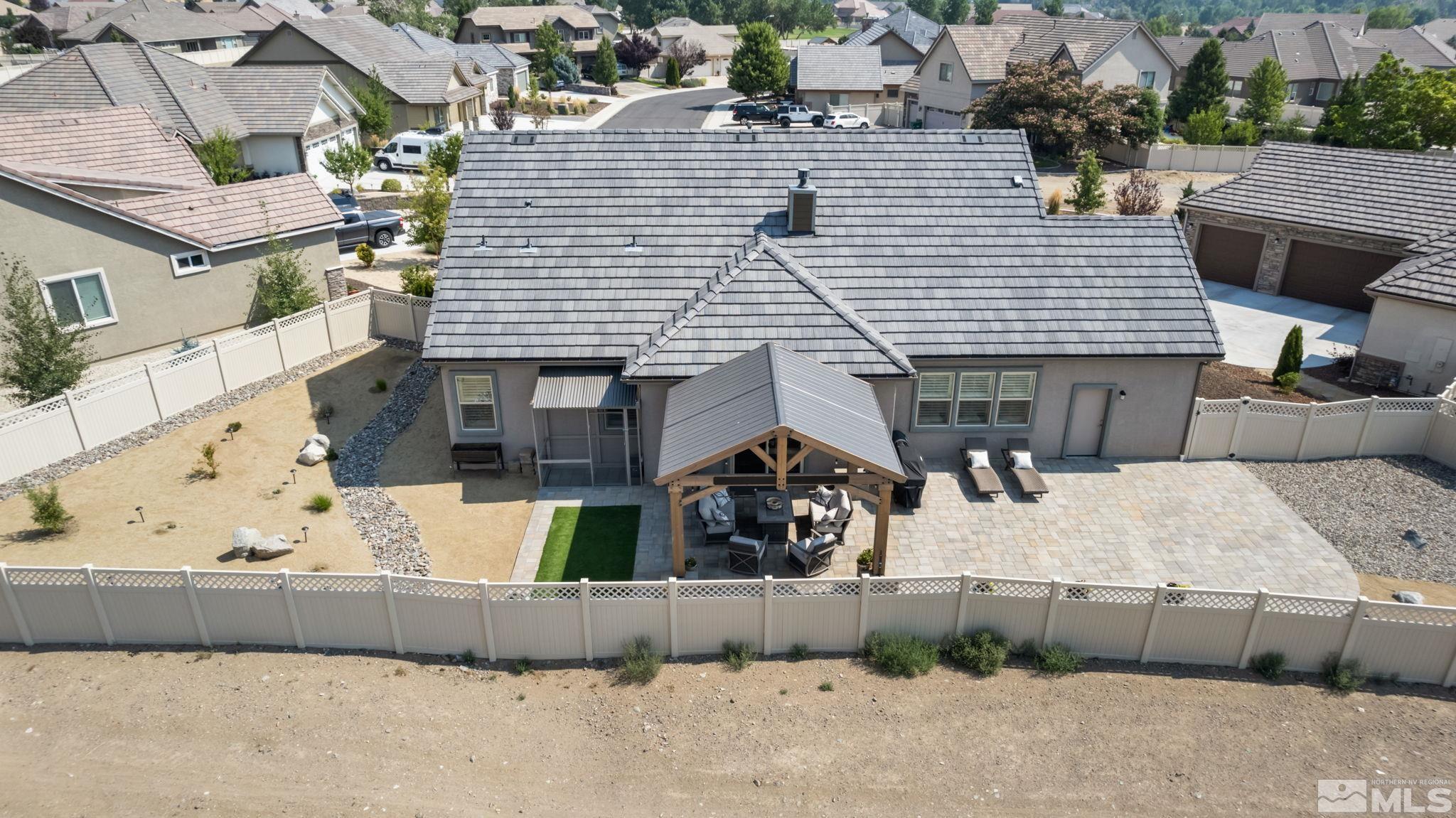 233 Cecina Drive Dayton, NV 89403 - Photo 32 of 39 a view of a house with a patio