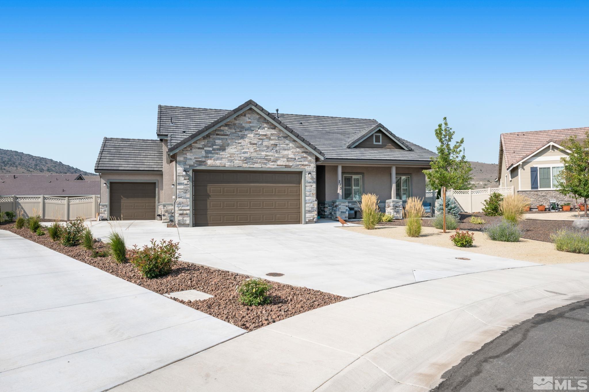 233 Cecina Drive Dayton, NV 89403 - Photo 5 of 39 a front view of a house with yard