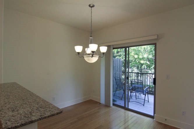 13420 Lyndhurst Street, Unit 401 408 303 Austin, TX 78717 - Photo 21 of 36 a view of a room with wooden floor and door