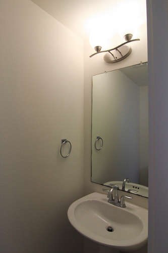 13420 Lyndhurst Street, Unit 401 408 303 Austin, TX 78717 - Photo 7 of 36 a bathroom with a sink and mirror