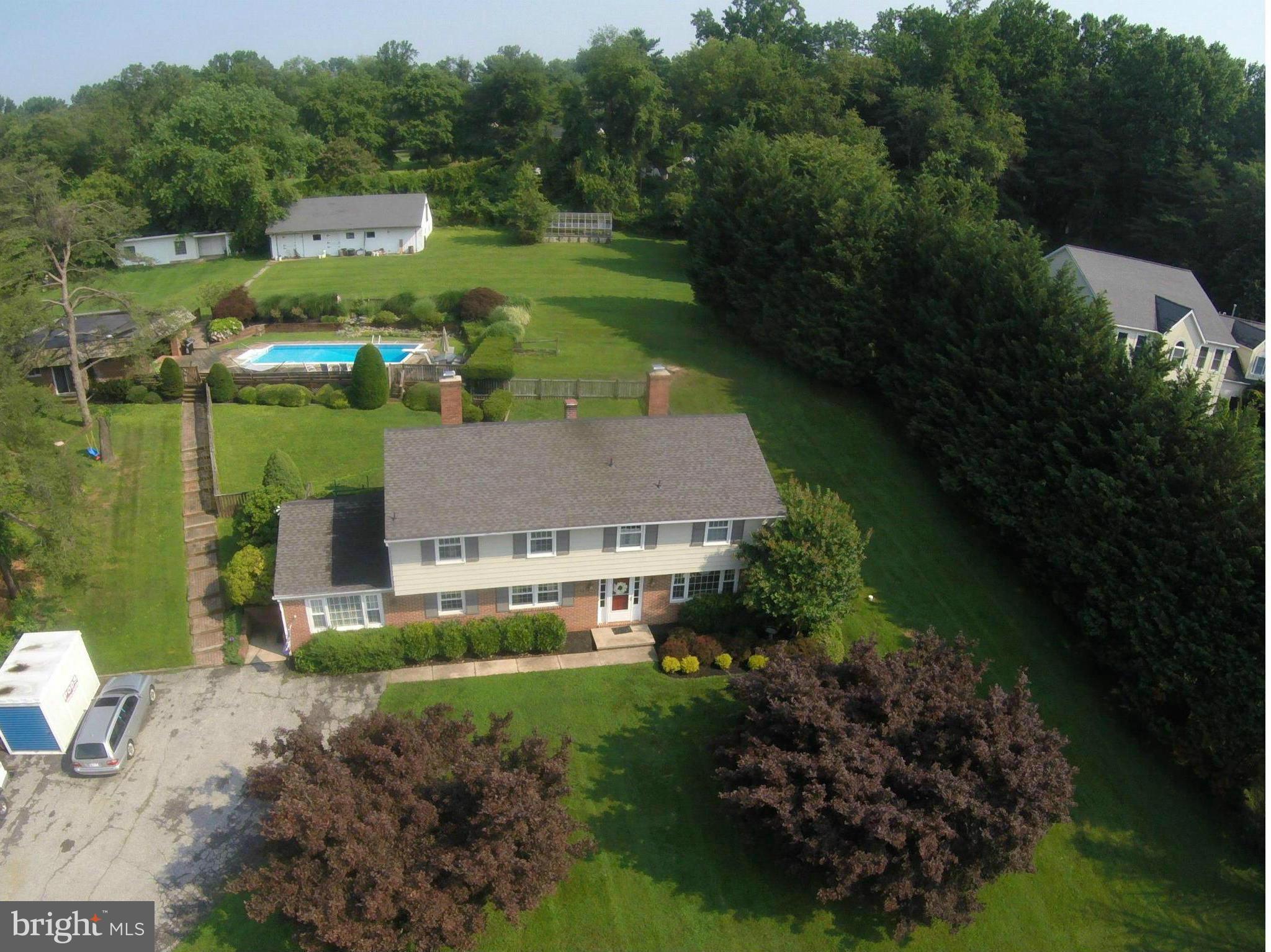 an aerial view of a house with a garden