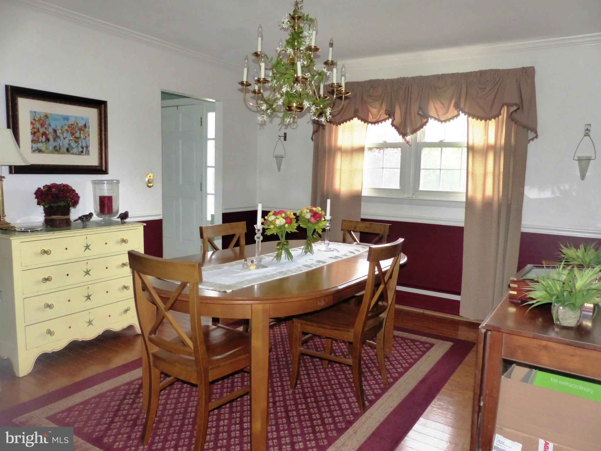 3004 Merrymans Mill Road Phoenix, MD 21131 - Photo 11 of 29 a view of a dining room with furniture window and wooden floor