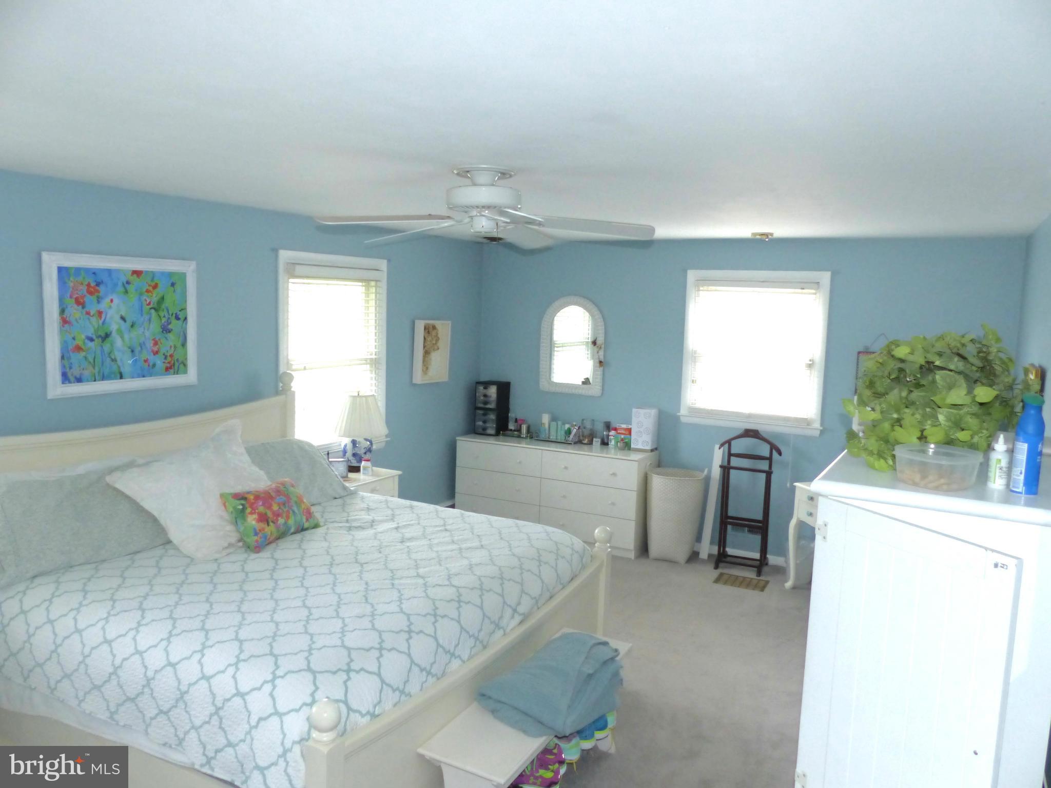 3004 Merrymans Mill Road Phoenix, MD 21131 - Photo 14 of 29 a bedroom with a bed and a mirror