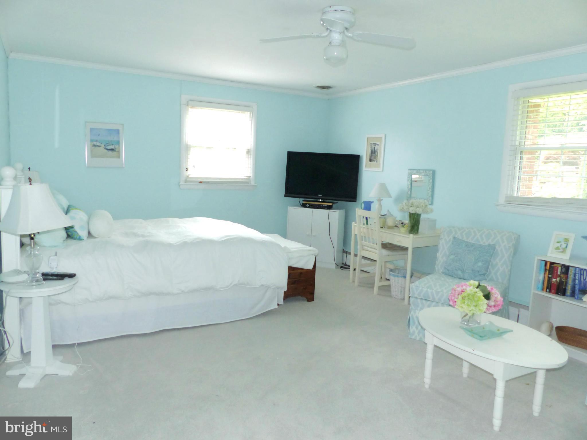 3004 Merrymans Mill Road Phoenix, MD 21131 - Photo 17 of 29 a bedroom with a bed and a flat screen tv