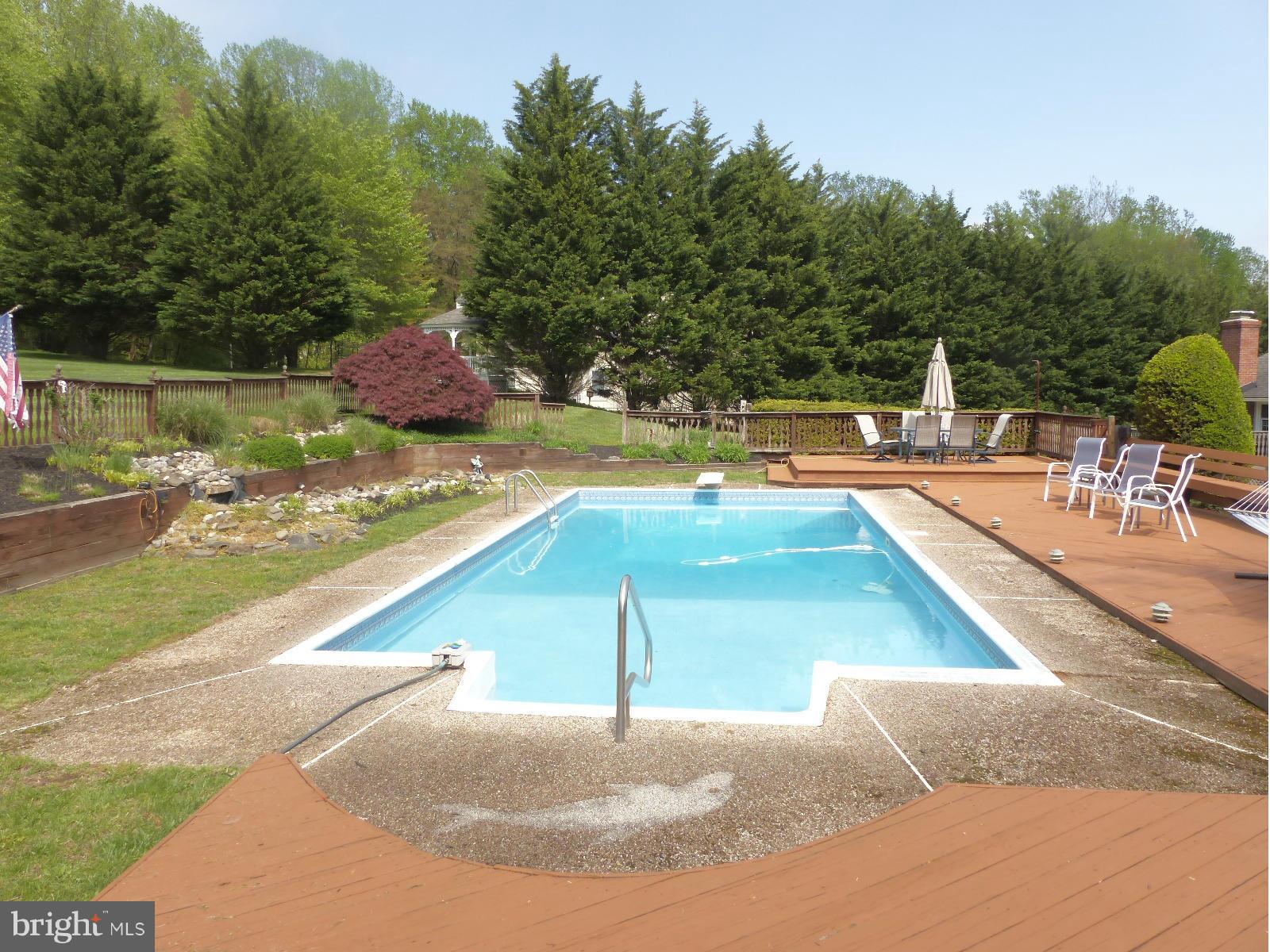 3004 Merrymans Mill Road Phoenix, MD 21131 - Photo 23 of 29 a view of a swimming pool with a patio