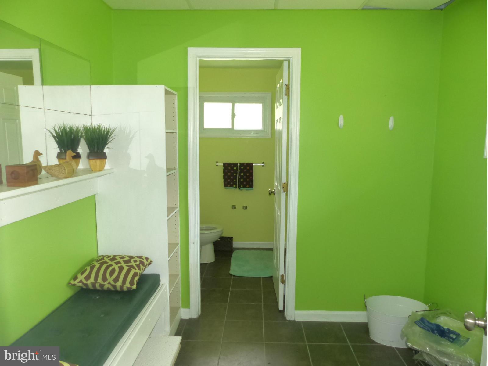 3004 Merrymans Mill Road Phoenix, MD 21131 - Photo 28 of 29 a bathroom with a sink and a mirror