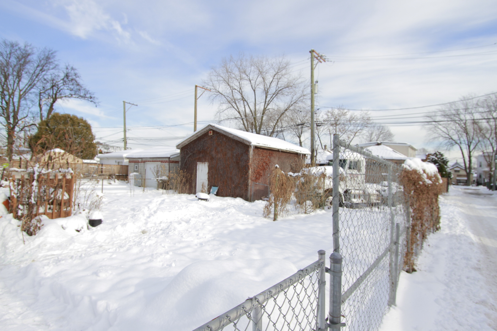 3417 North Kostner Avenue Chicago, IL 60641 - Photo 5 of 6 a view of a house with a snow