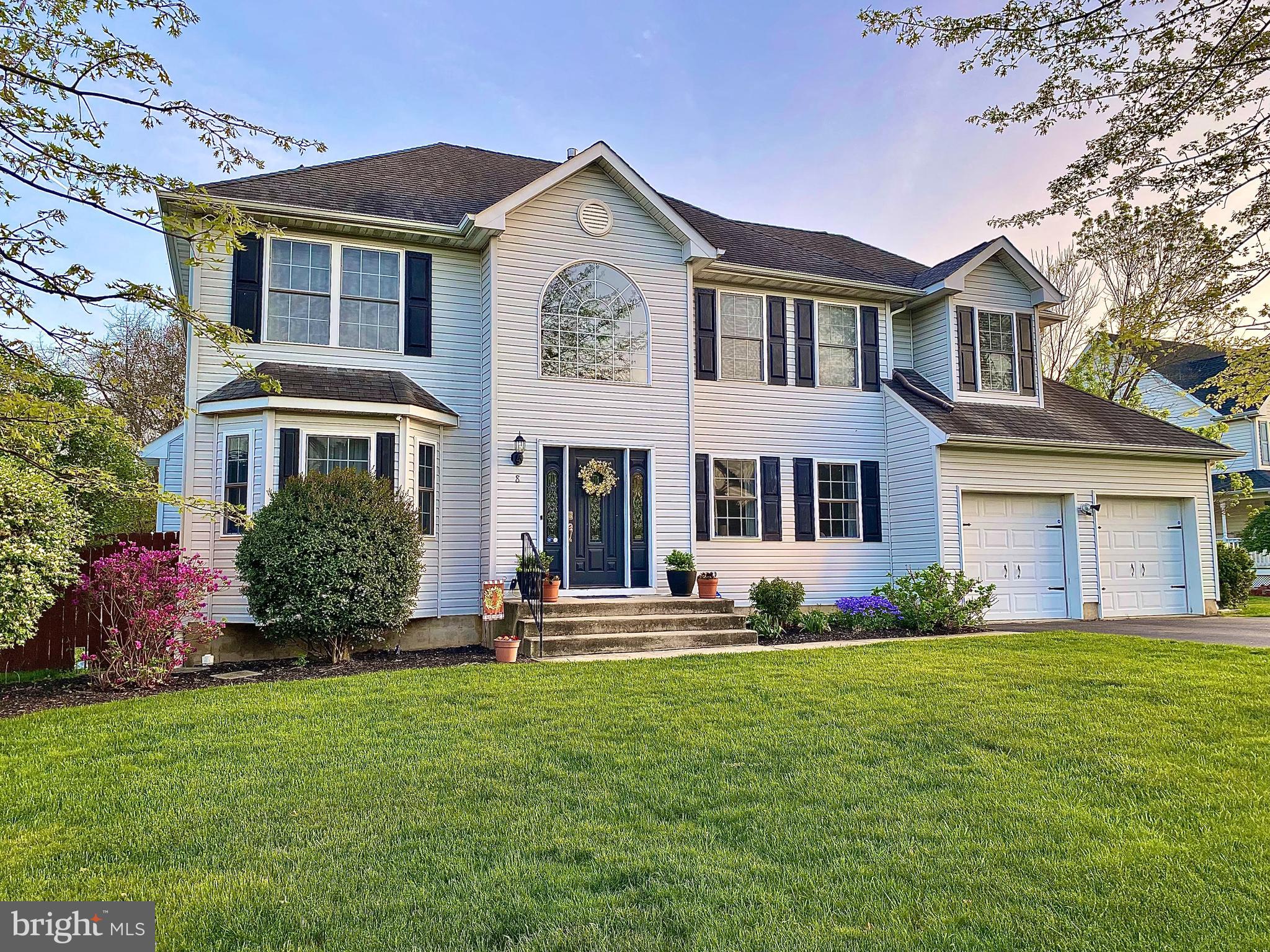 8 Augusta Street Wrightstown, NJ 08562 - Photo 1 of 44 a front view of a house with a yard