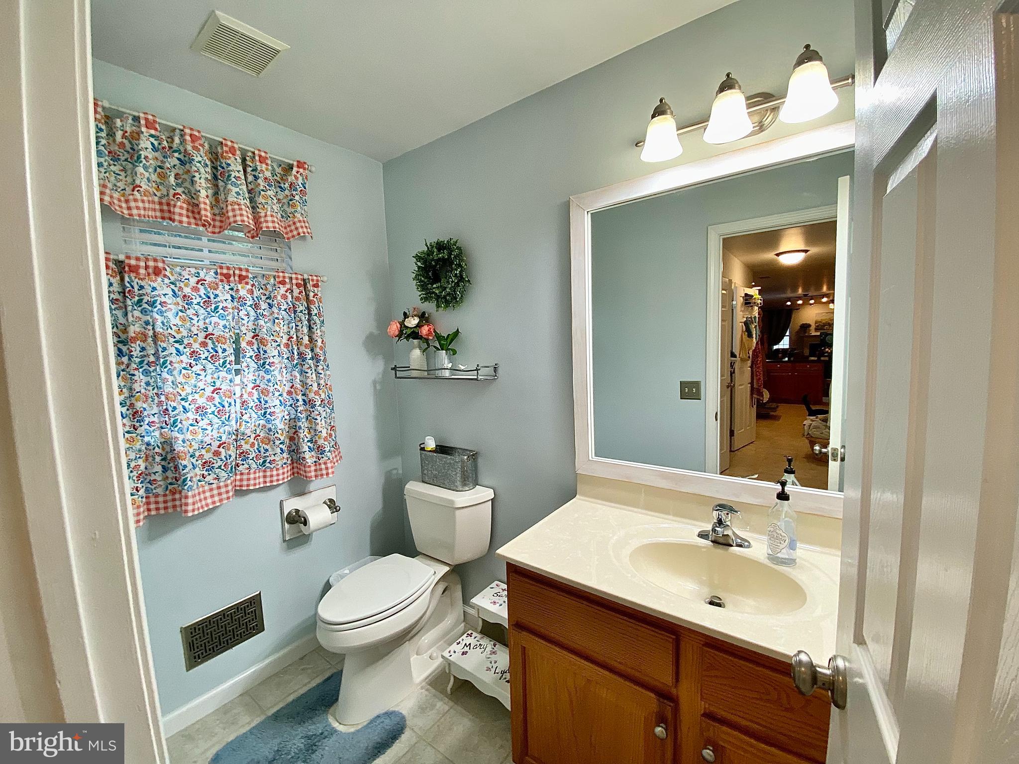 8 Augusta Street Wrightstown, NJ 08562 - Photo 13 of 44 a bathroom with a sink toilet and shower