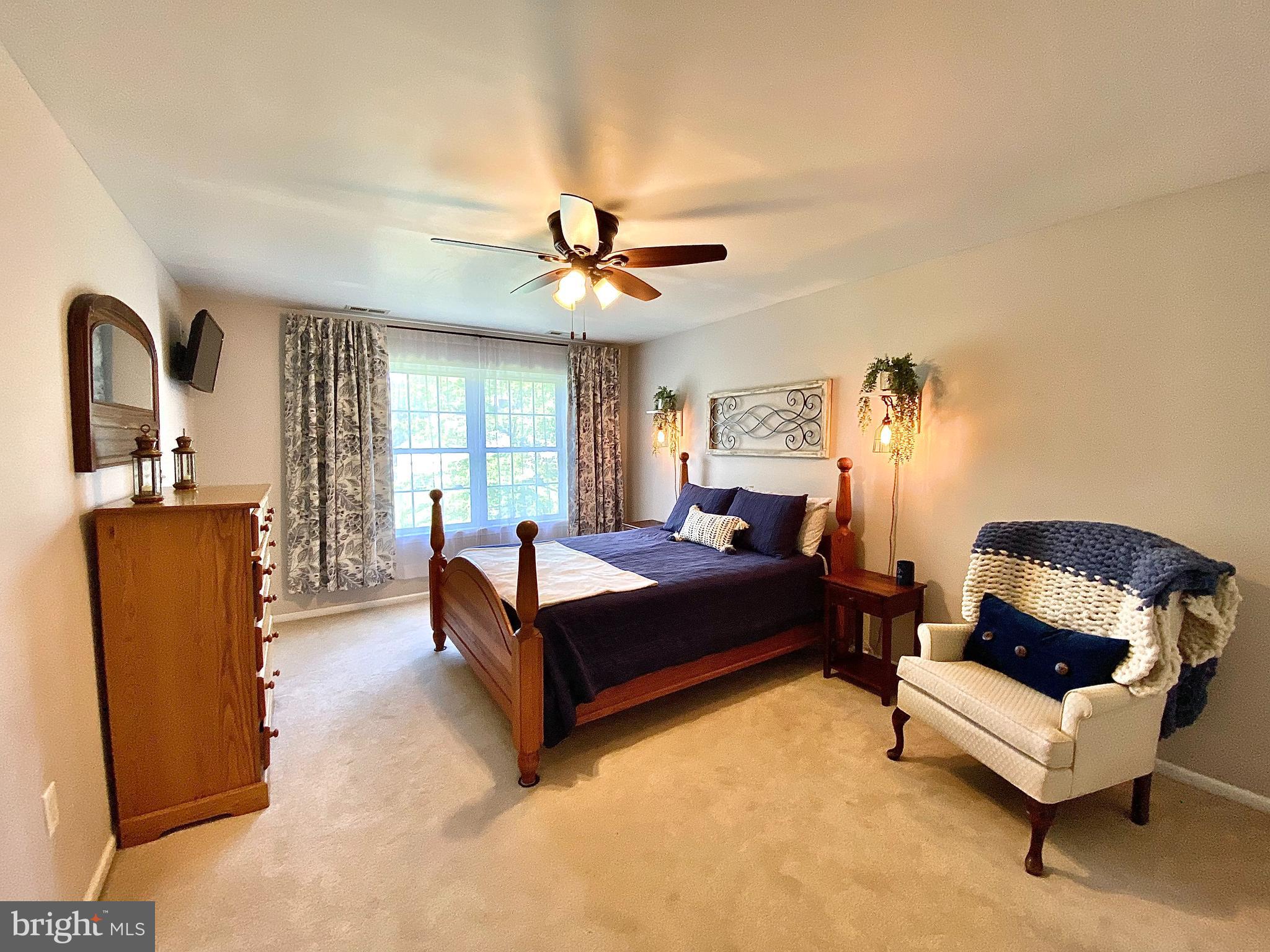 8 Augusta Street Wrightstown, NJ 08562 - Photo 15 of 44 a living room with furniture and a large window