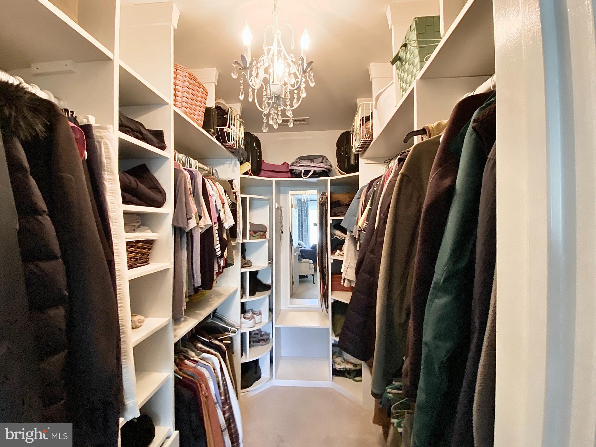 8 Augusta Street Wrightstown, NJ 08562 - Photo 17 of 44 a view of walk in closet with clothes and shoes