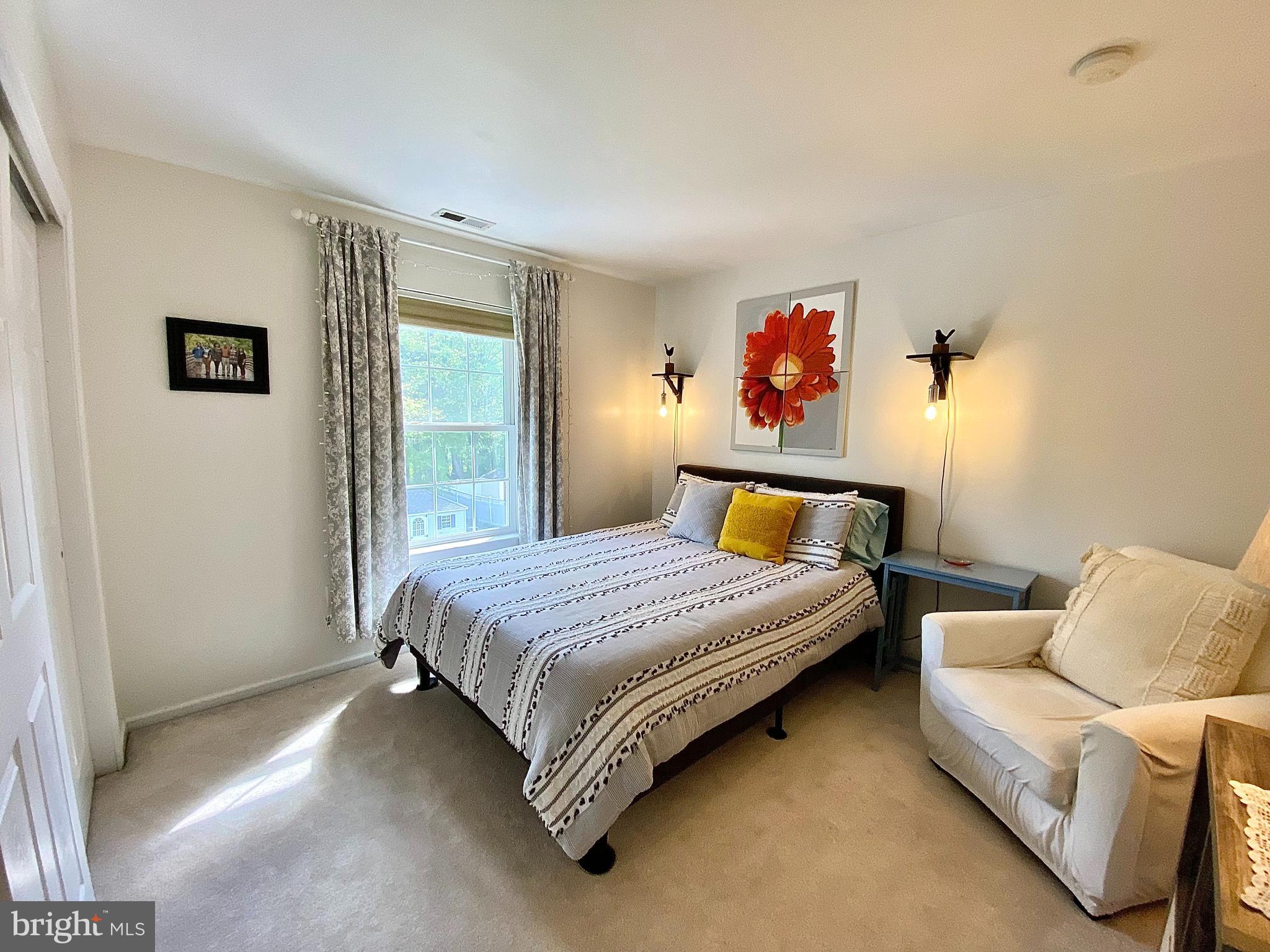 8 Augusta Street Wrightstown, NJ 08562 - Photo 19 of 44 a bedroom with a bed and a couch