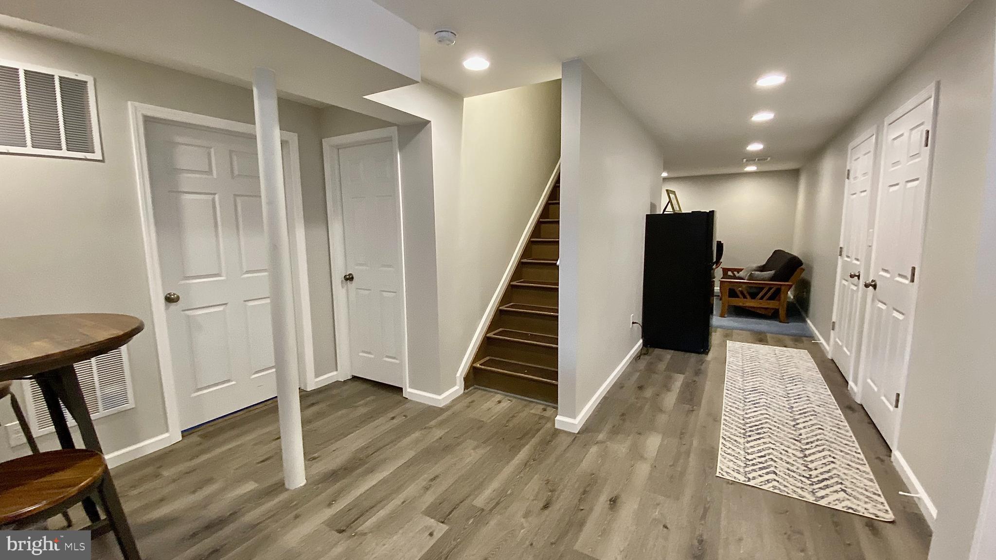 8 Augusta Street Wrightstown, NJ 08562 - Photo 25 of 44 a view of entryway with wooden floor and stairs