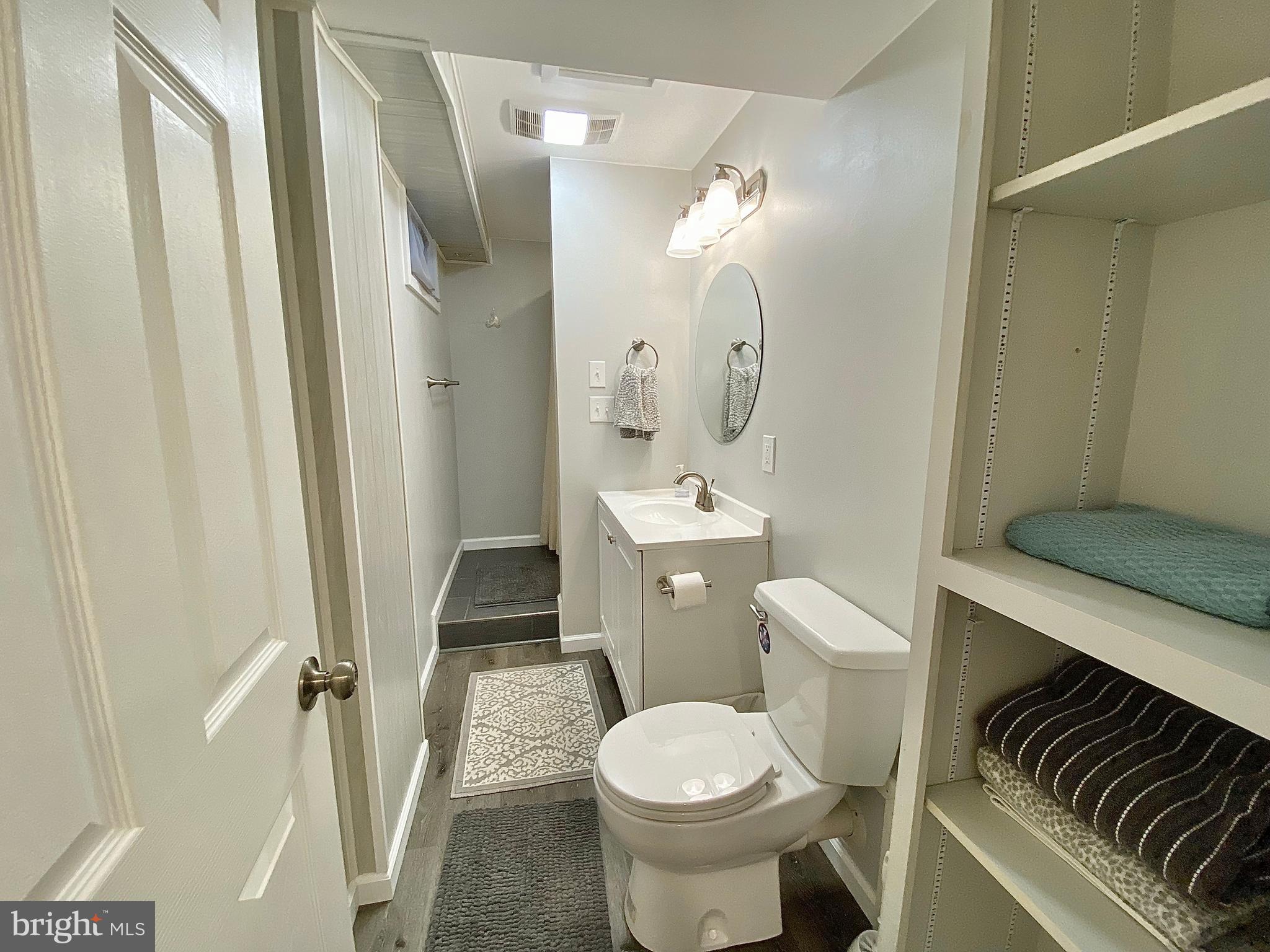 8 Augusta Street Wrightstown, NJ 08562 - Photo 33 of 44 a bathroom with a sink a toilet and shower