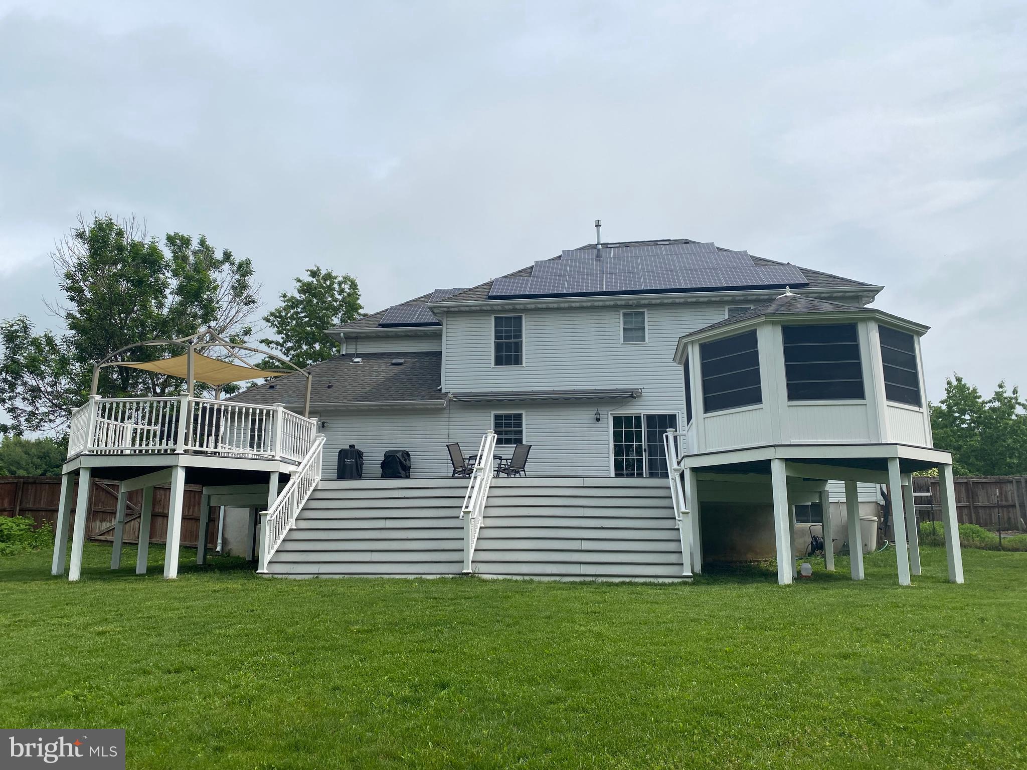 8 Augusta Street Wrightstown, NJ 08562 - Photo 37 of 44 a front view of a house with a garden