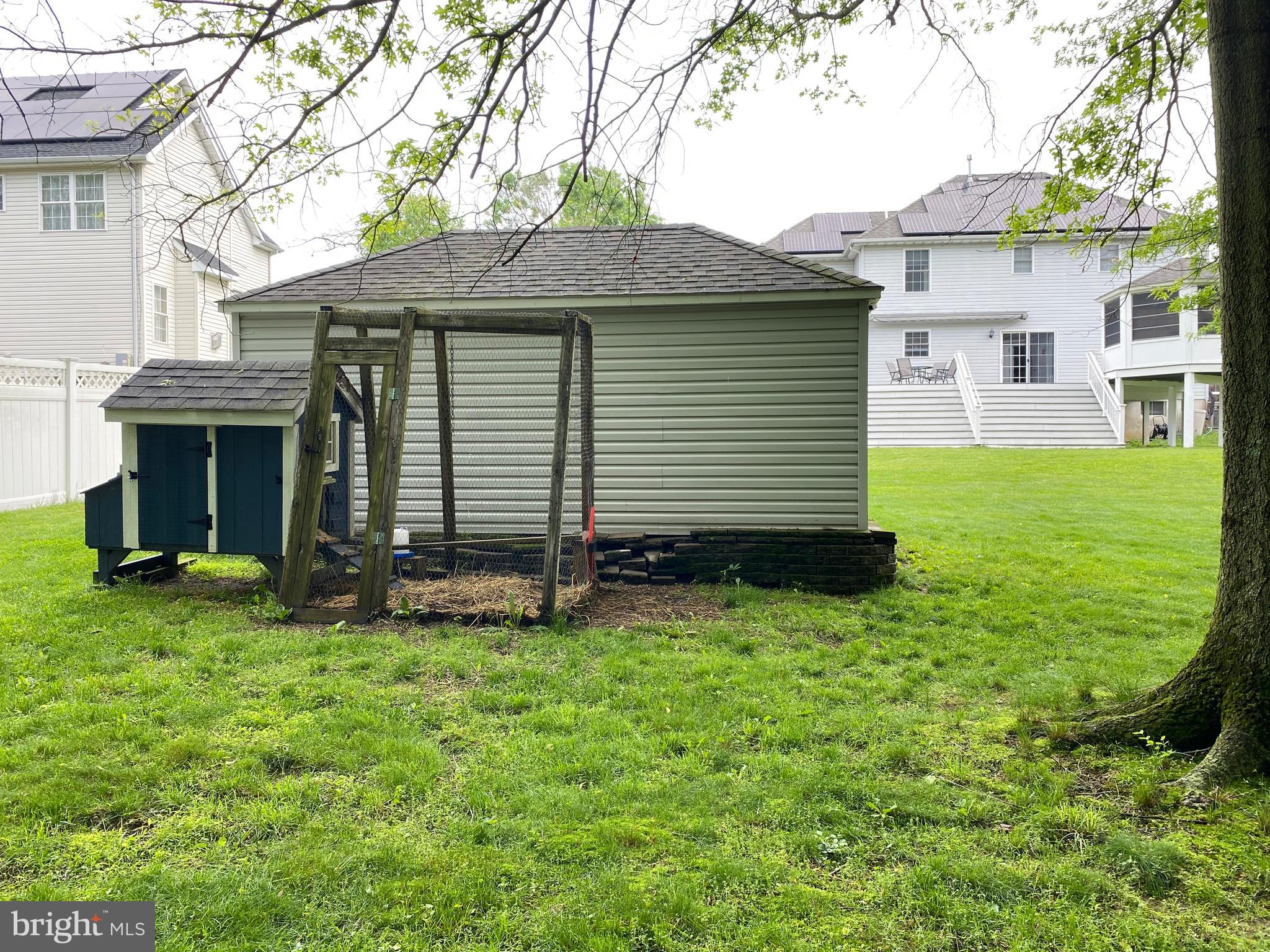 8 Augusta Street Wrightstown, NJ 08562 - Photo 44 of 44 a front view of a house with a garden