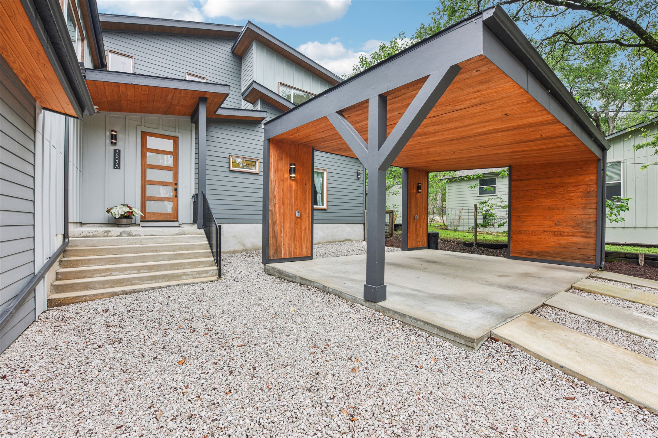 3607 Grant Street, Unit A Austin, TX 78721 - Photo 2 of 40 a front view of a house with a yard