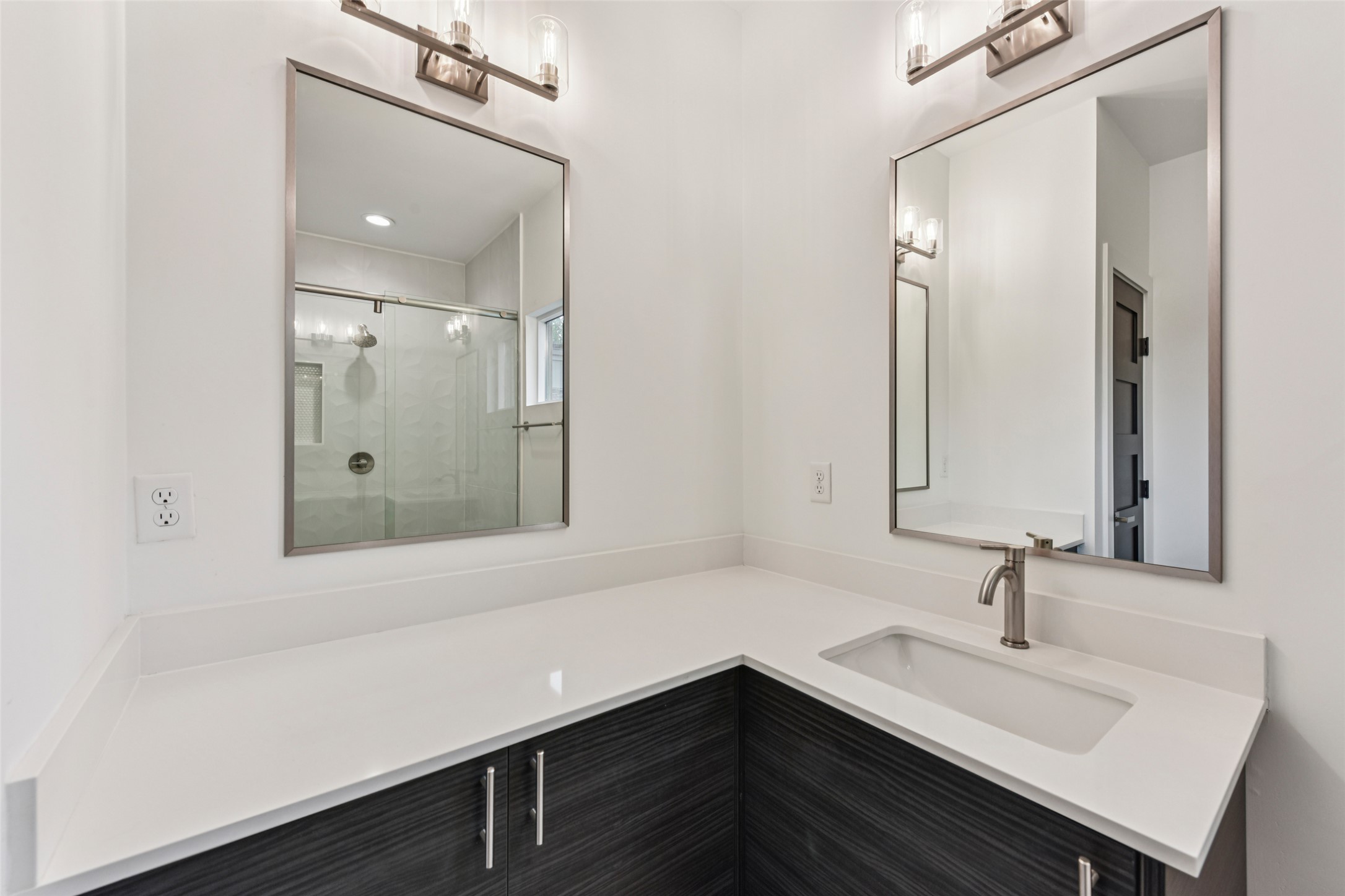 3607 Grant Street, Unit A Austin, TX 78721 - Photo 27 of 40 a bathroom with a sink and a mirror