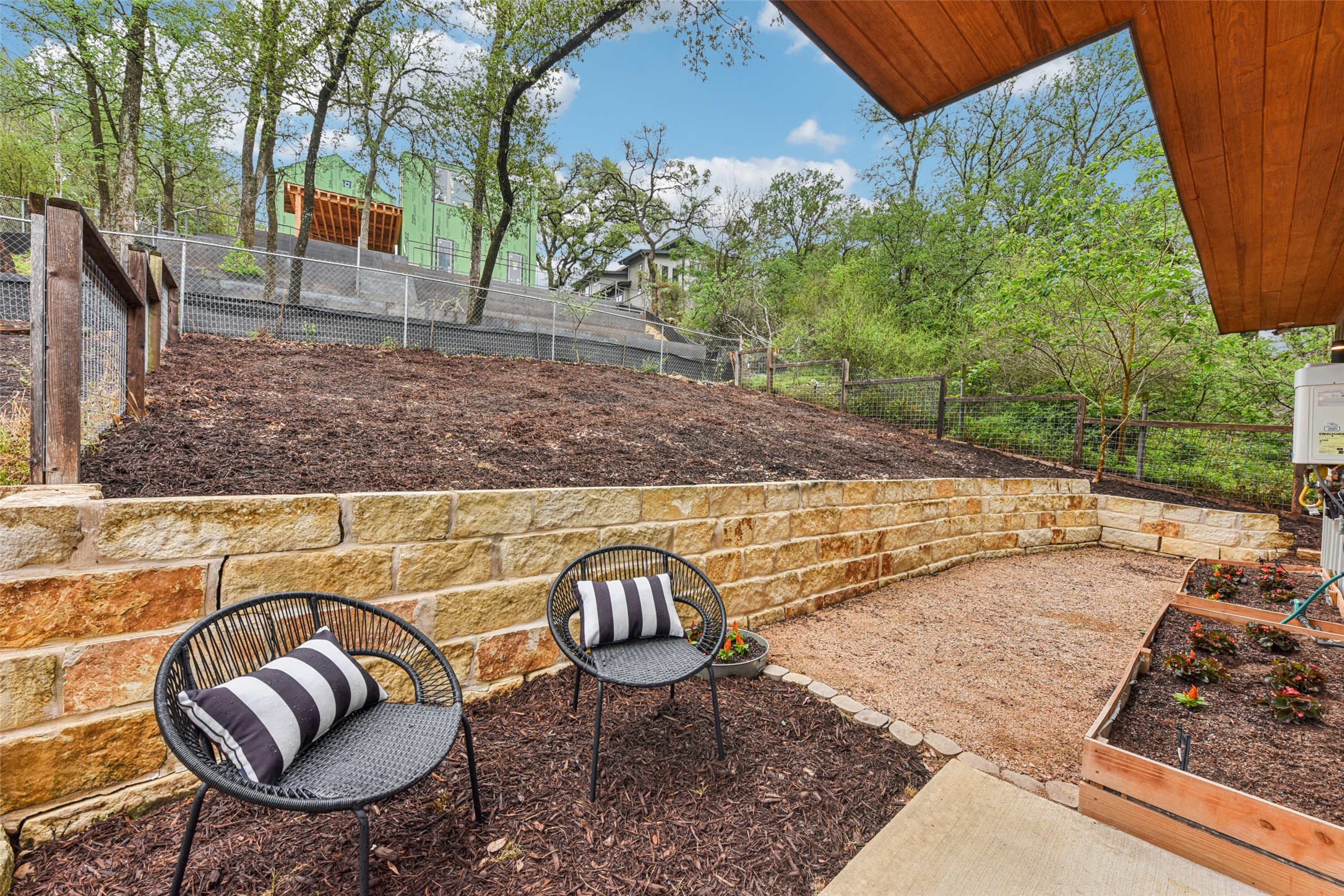 3607 Grant Street, Unit A Austin, TX 78721 - Photo 28 of 40 a view of a backyard with sitting area