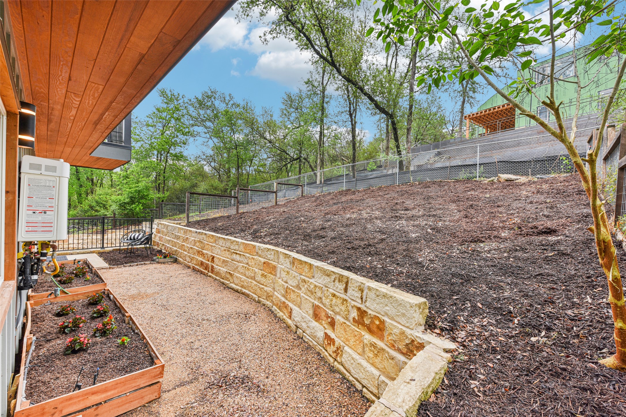 3607 Grant Street, Unit A Austin, TX 78721 - Photo 29 of 40 a view of backyard with large trees