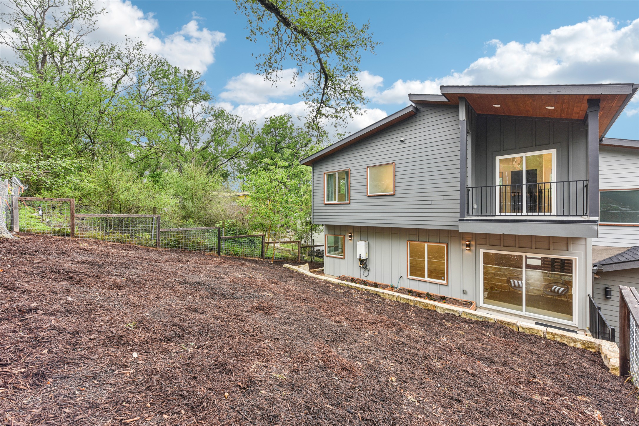 3607 Grant Street, Unit A Austin, TX 78721 - Photo 33 of 40 a front view of a house with a garden