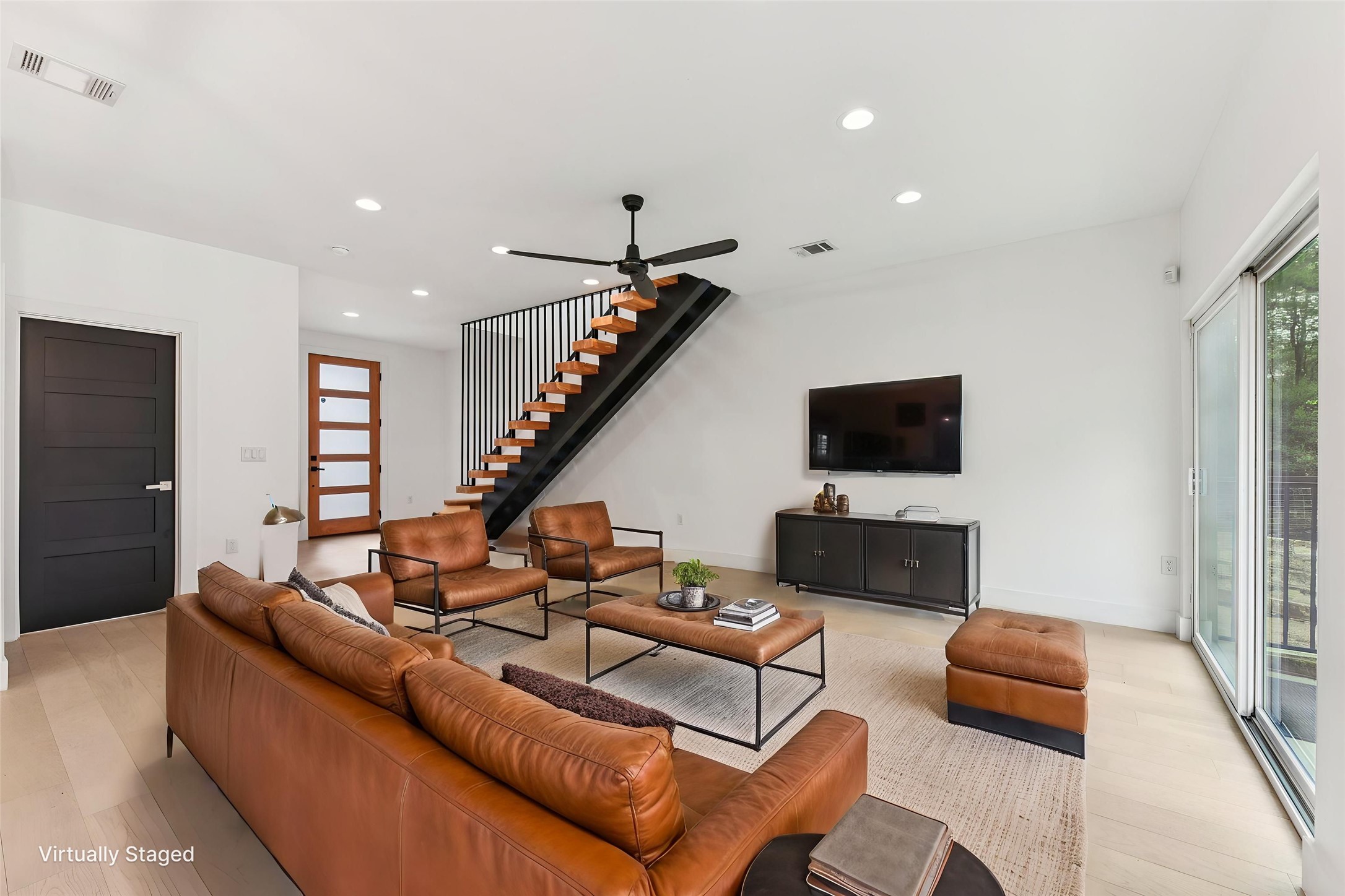 3607 Grant Street, Unit A Austin, TX 78721 - Photo 3 of 40 a living room with furniture and a flat screen tv