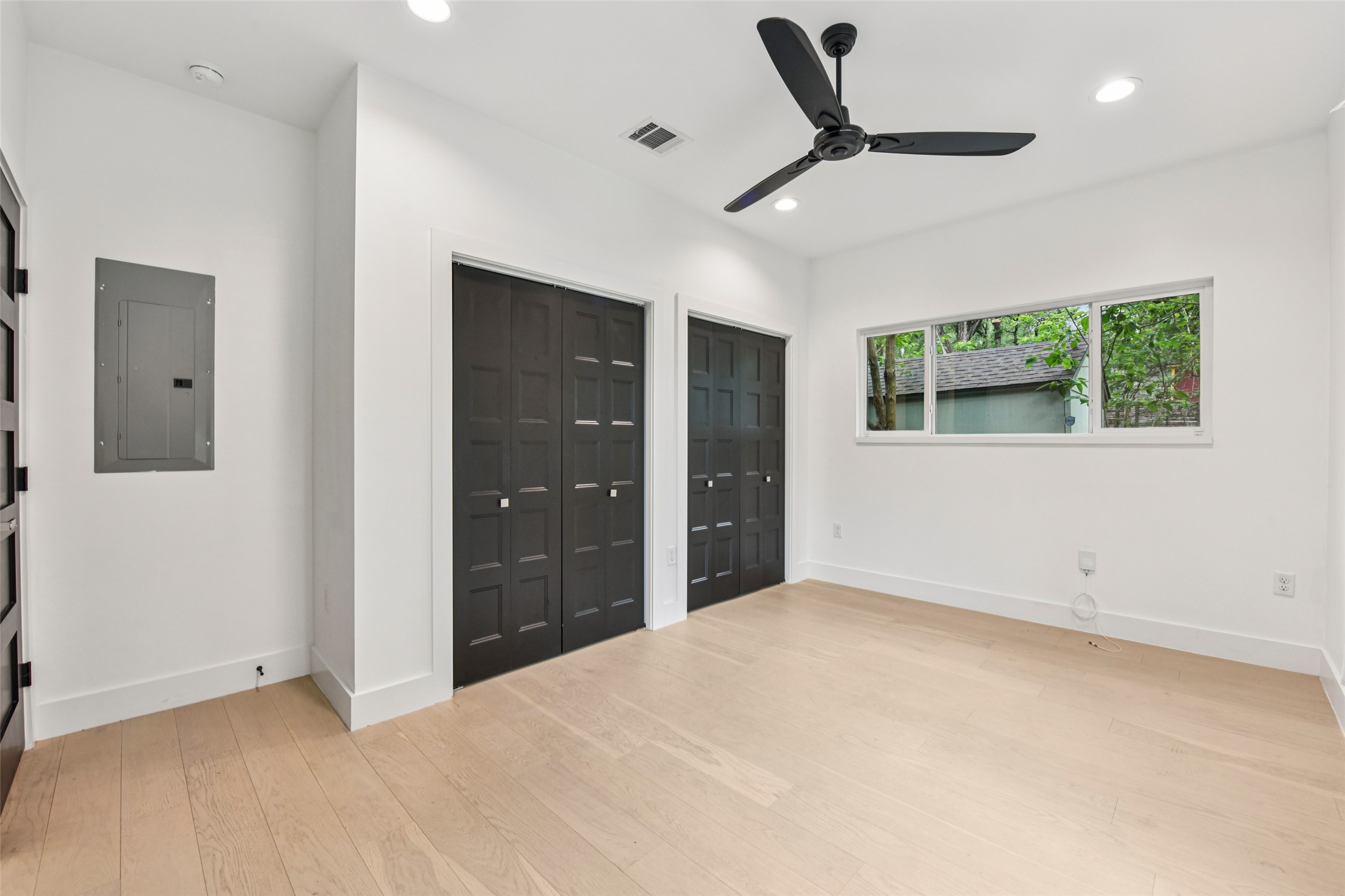 3607 Grant Street, Unit A Austin, TX 78721 - Photo 9 of 40 a view of an empty room with a window