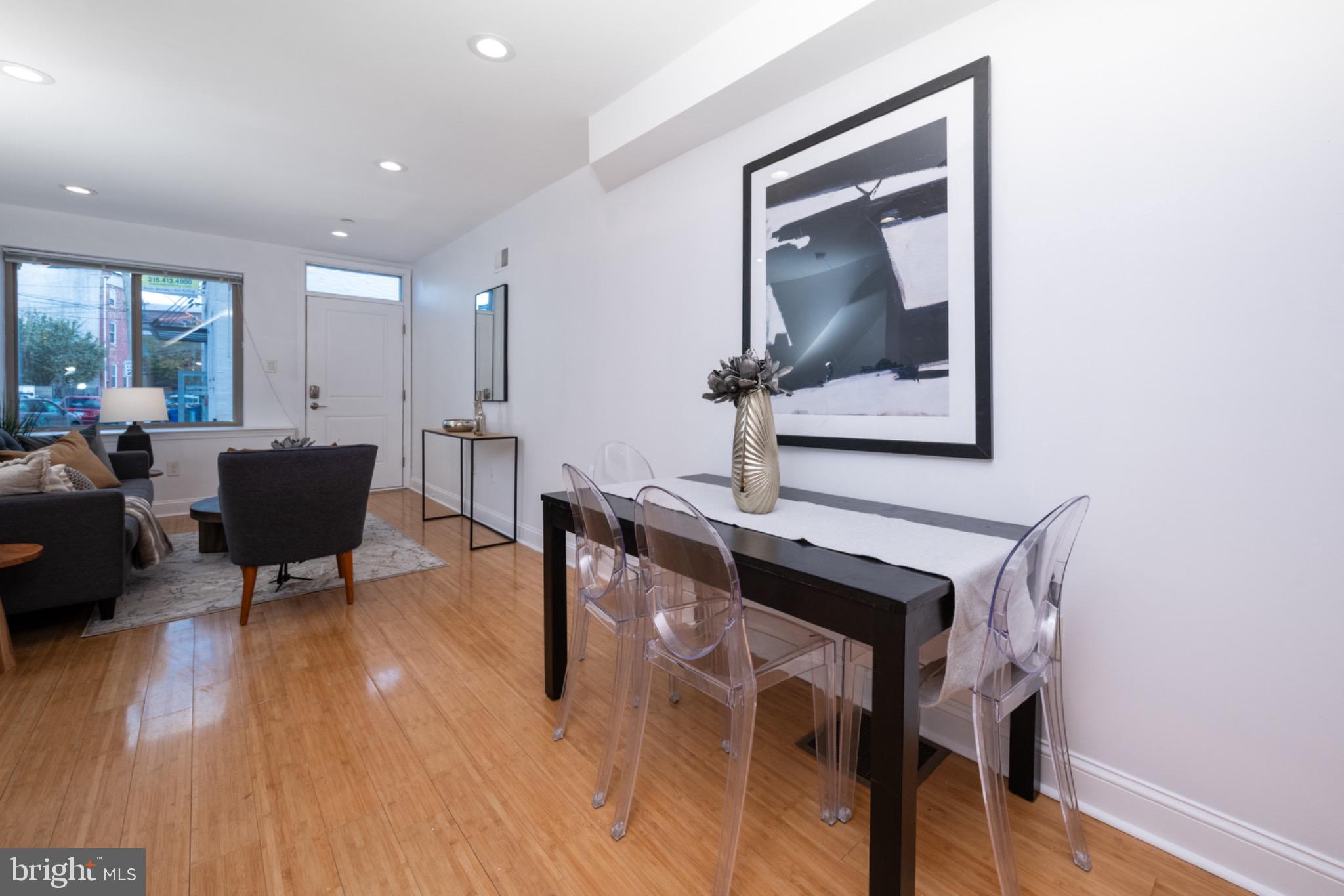 2102 Berges Street, Unit B Philadelphia, PA 19125 - Photo 11 of 29 a view of a dining room with furniture and wooden floor