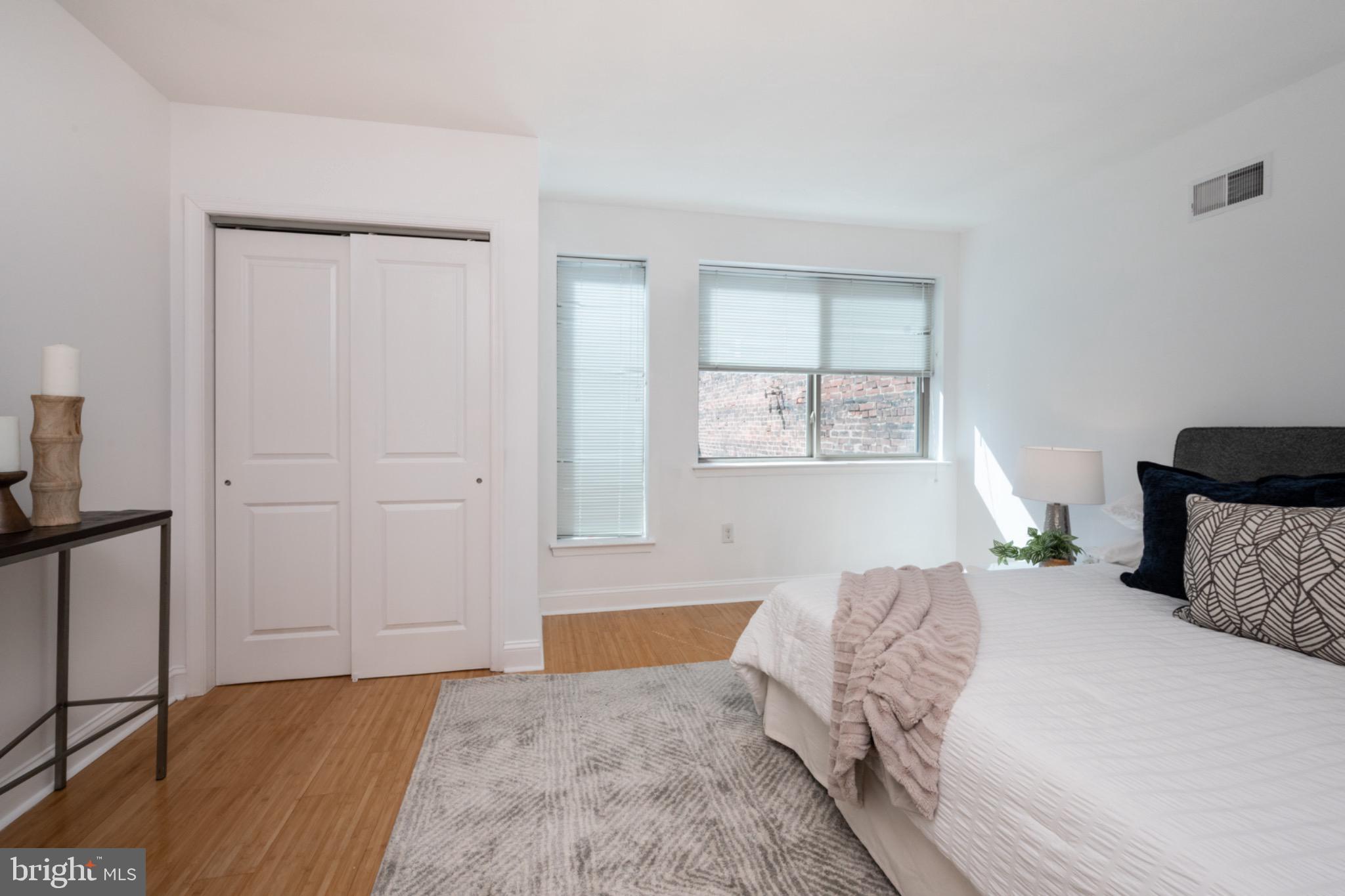2102 Berges Street, Unit B Philadelphia, PA 19125 - Photo 22 of 29 a bedroom with a large bed and a window