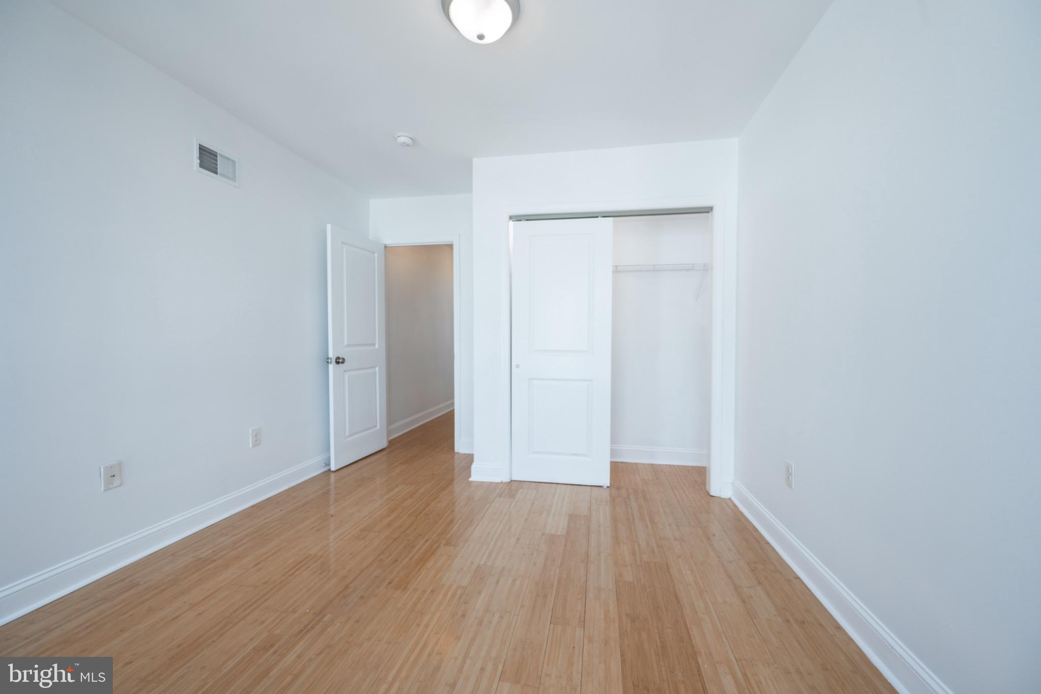 2102 Berges Street, Unit B Philadelphia, PA 19125 - Photo 27 of 29 a view of a room with wooden floor