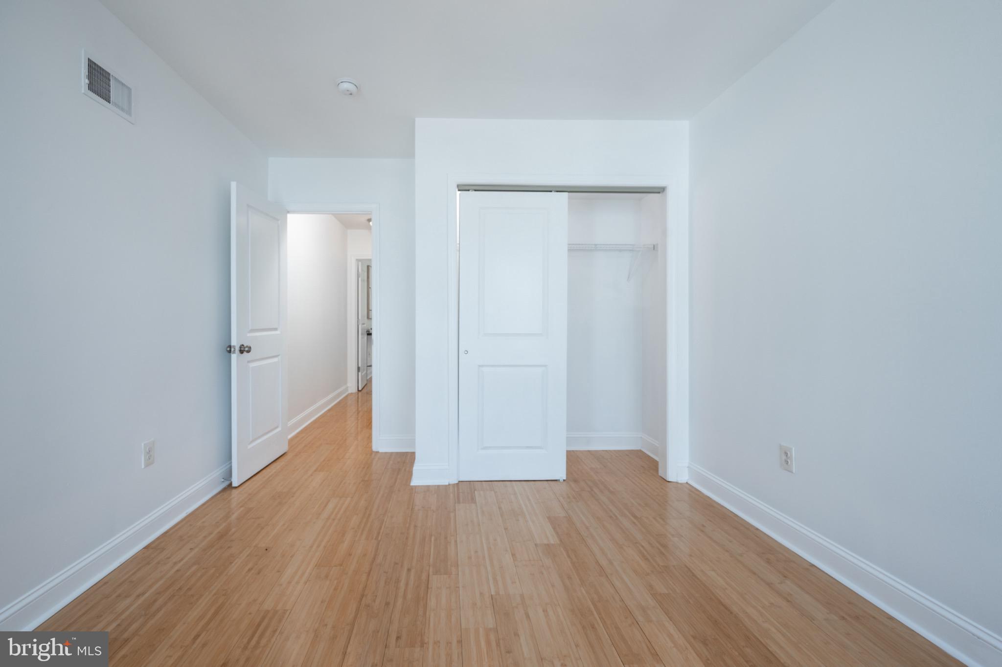 2102 Berges Street, Unit B Philadelphia, PA 19125 - Photo 28 of 29 a view of an empty room with wooden floor