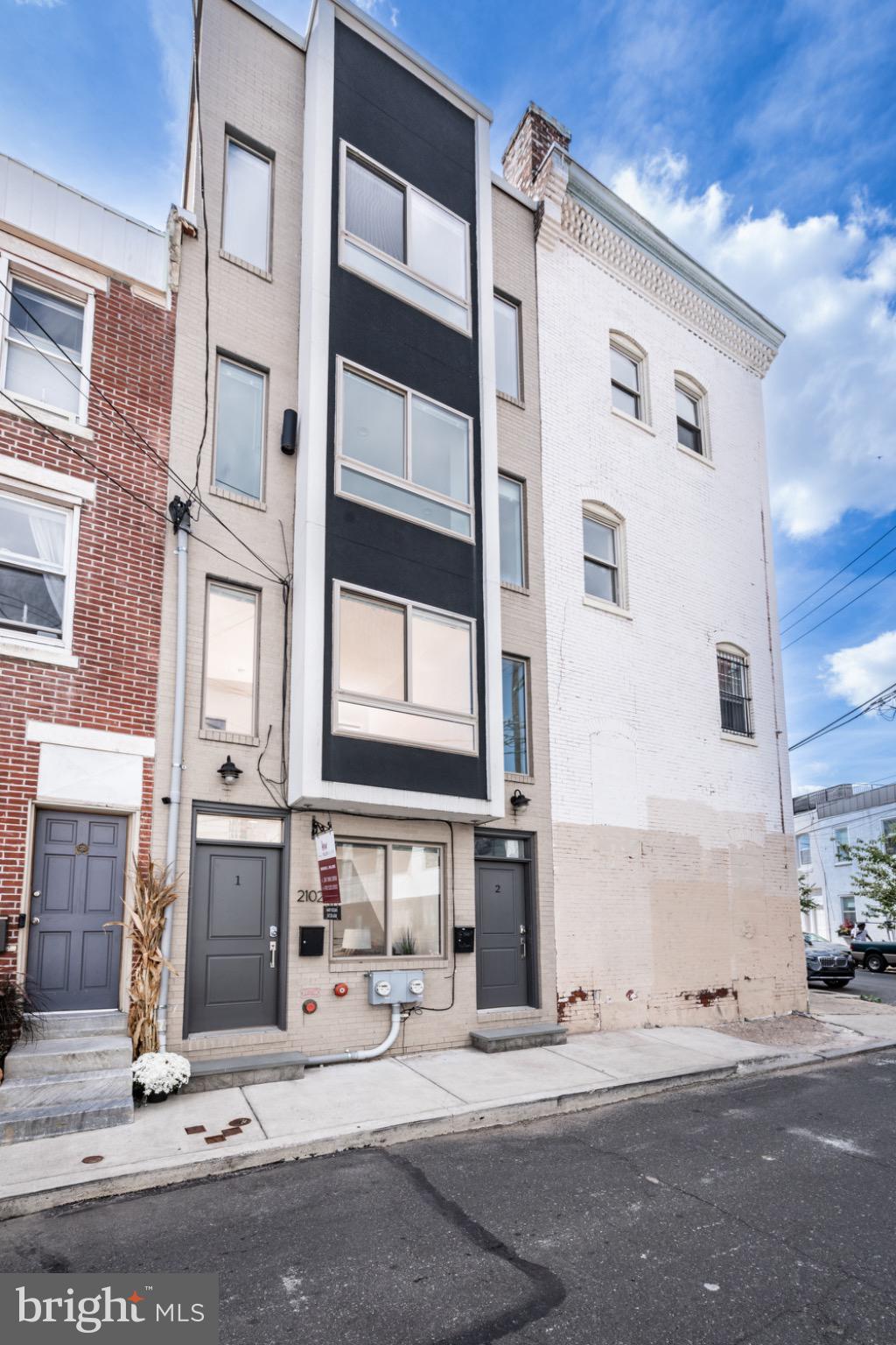 2102 Berges Street, Unit B Philadelphia, PA 19125 - Photo 29 of 29 a view of a building with a street