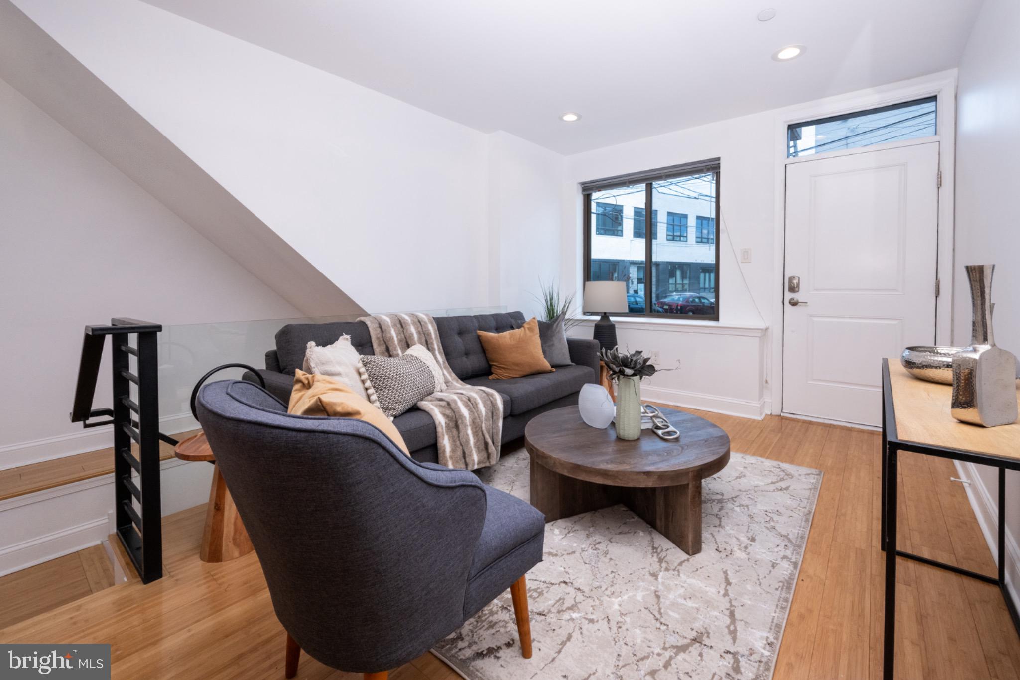 2102 Berges Street, Unit B Philadelphia, PA 19125 - Photo 5 of 29 a living room with furniture and a window