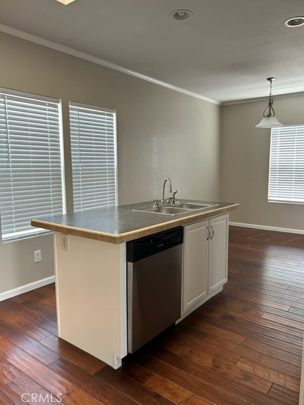 2755 Arrow Highway, Unit 13 La Verne, CA 91750 - Photo 7 of 9 a kitchen with a sink cabinets and wooden floor