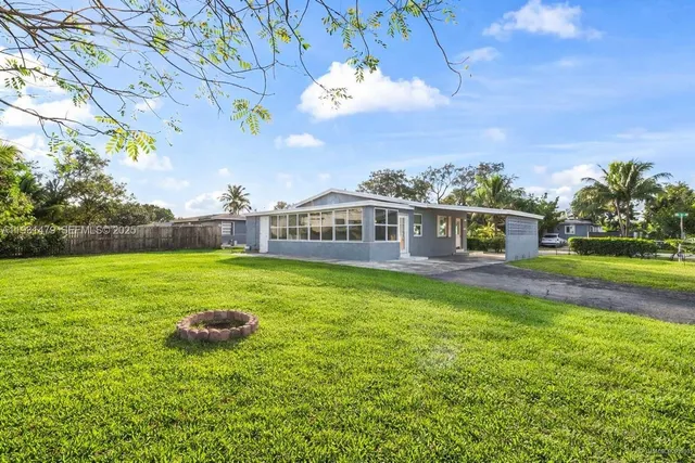 a house view with a garden space
